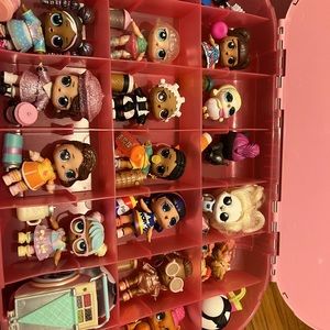 LOL surprise dolls, babies, pets, kids, extra clothes, and 2 stands.